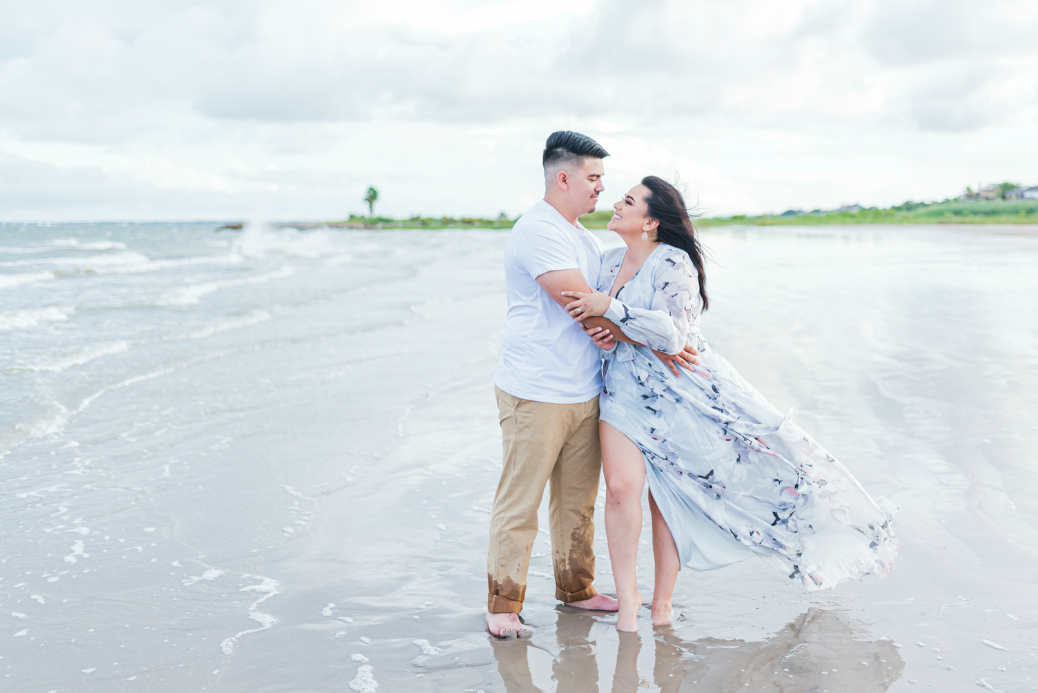 couple at beach for engagement photos